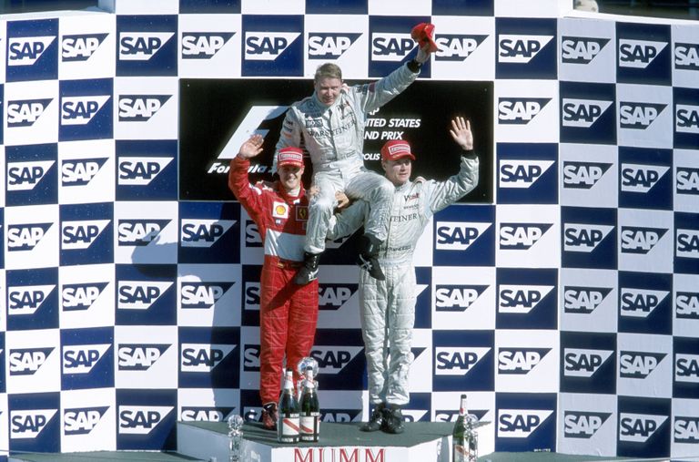 Michael Schumacheri (punases) rekordseeria algas siit, USA GP 2001. Seitsmekordne maailmameister saavutas seal Mika Häkkineni (keskel) järel ja David Coulthardi ees teise koha.