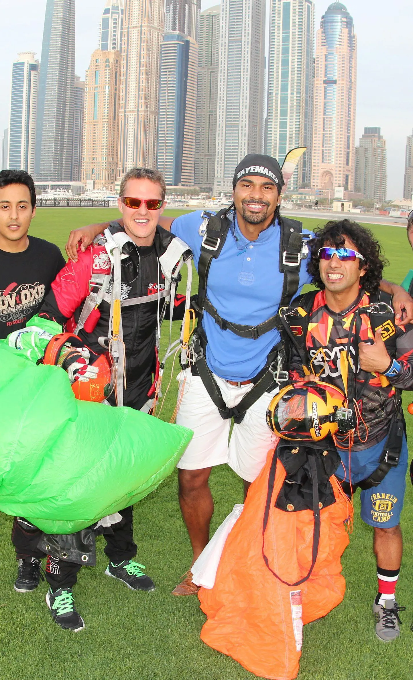 Michael Schumacher (vasakult teine) ja David Haye (paremalt teine).
