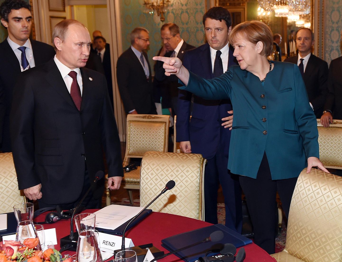 Vladimir Putin (vasakul) ja Angela Merkel (paremal) 2014. aastal Itaalias