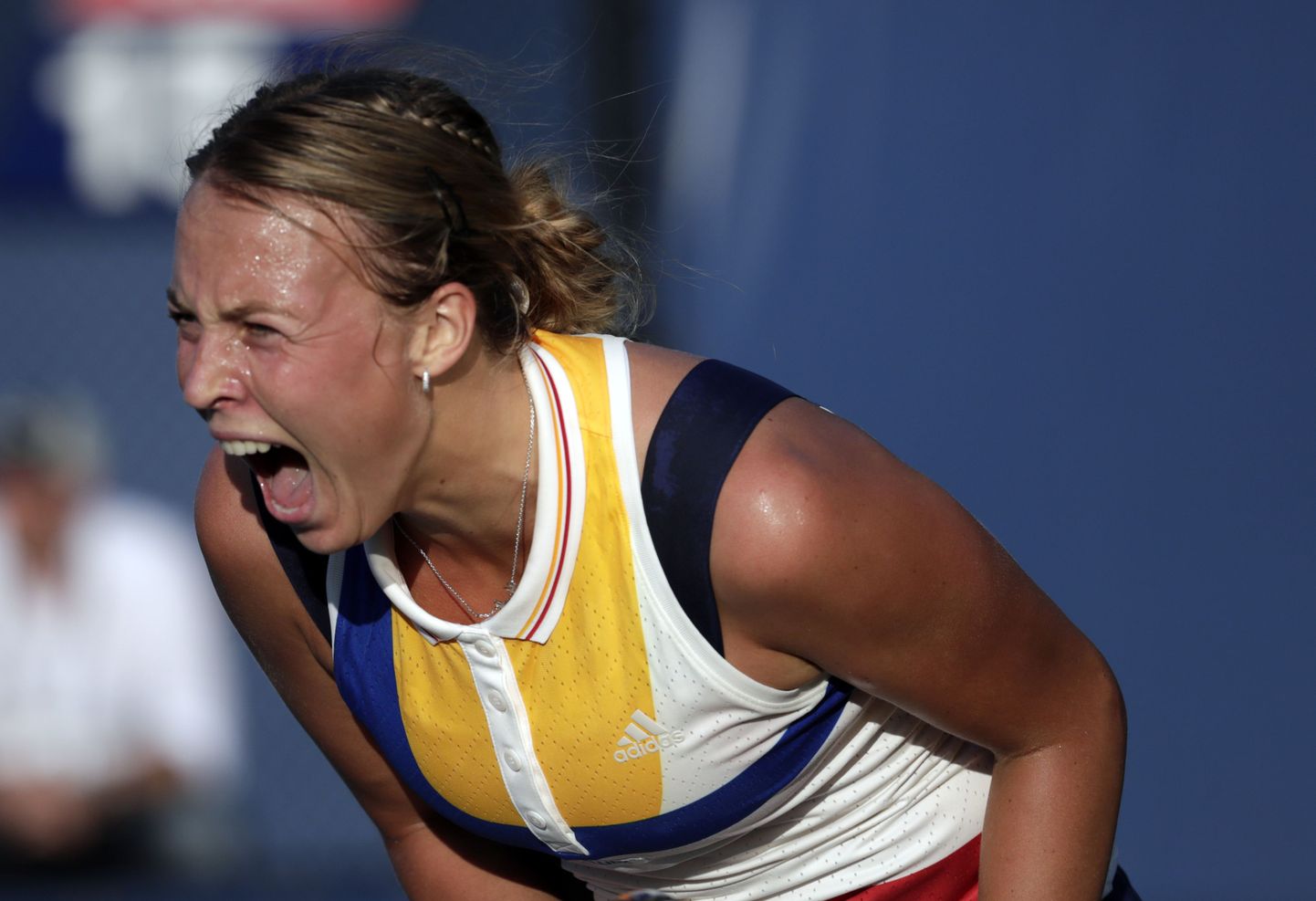 Anett Kontaveit, of Estonia, reacts after scoring a point against Lucie Safarova, of Czech Republic, during the first round of the U.S. Open tennis tournament, Wednesday, Aug. 30, 2017, in New York. (AP Photo/Julio Cortez)