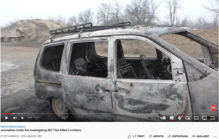 Ekrānšāviņš no video, kurā Doņeckas tautas republika rāda it kā ukraiņu sadedzinātu auto ar trīs nogalinātu cilvēku līķiem. Vairākas pazīmes liecina, ka redzamais ir safabricēts.
