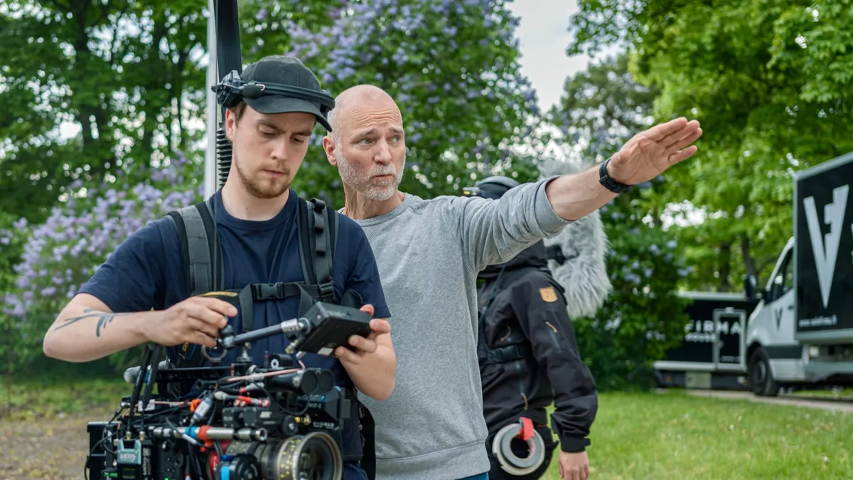 Aku Louhimies (right) on the set of TV series "Conflict" (2024).